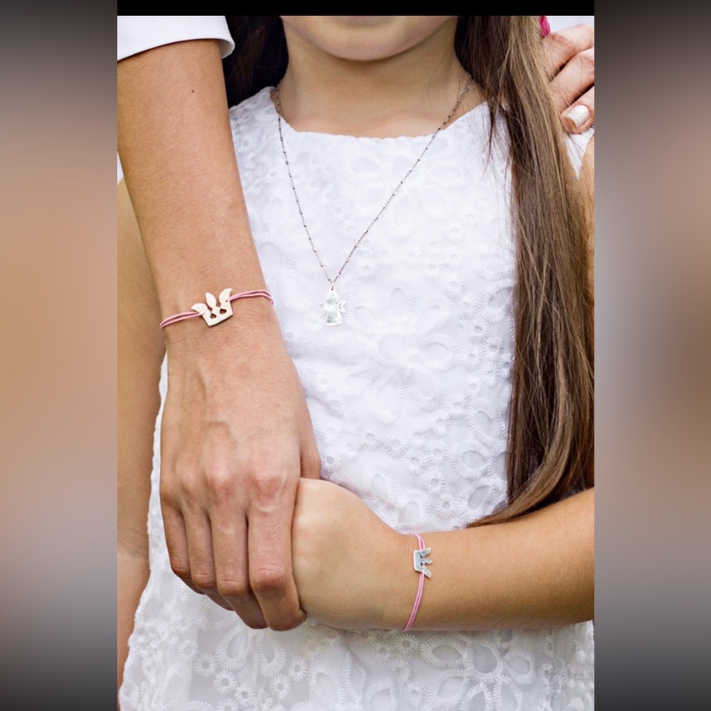 925 sterling silver mom and daughter crown charm on a adjustable thread cord.